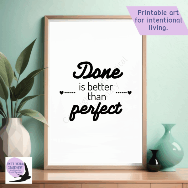Framed printable art with the quote ‘Done is better than perfect’ in stylish fonts, placed on a wooden surface with a plant and vases, against a light green wall. Includes Swift Digital Stationery branding.